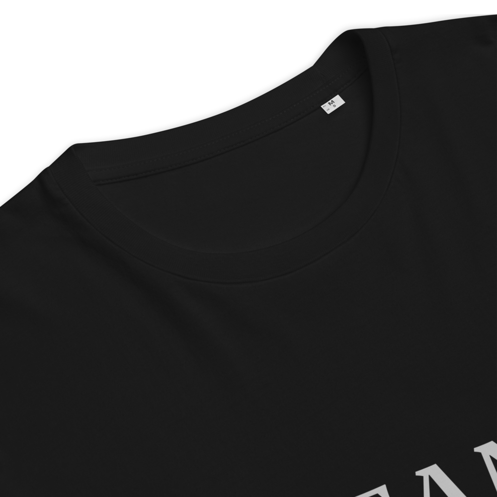 Close-up of a black t-shirt with a brand label on the collar.